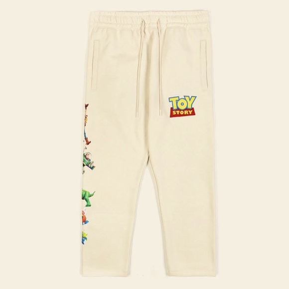 Pixar Toy Story Beige Cast
SweatPants Joggers Logo Movie
NWT Multi Sizes - Picture 1 of 8